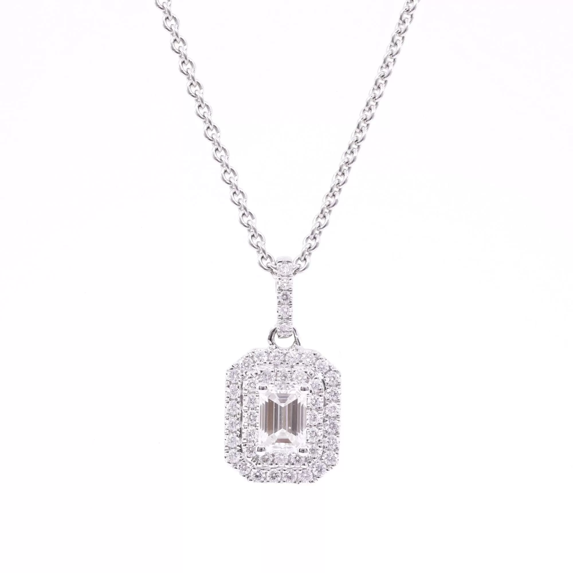 14K WHITE GOLD DOUBLE DIAMOND HALO PENDANT WITH AN EMERALD-CUT CENTER