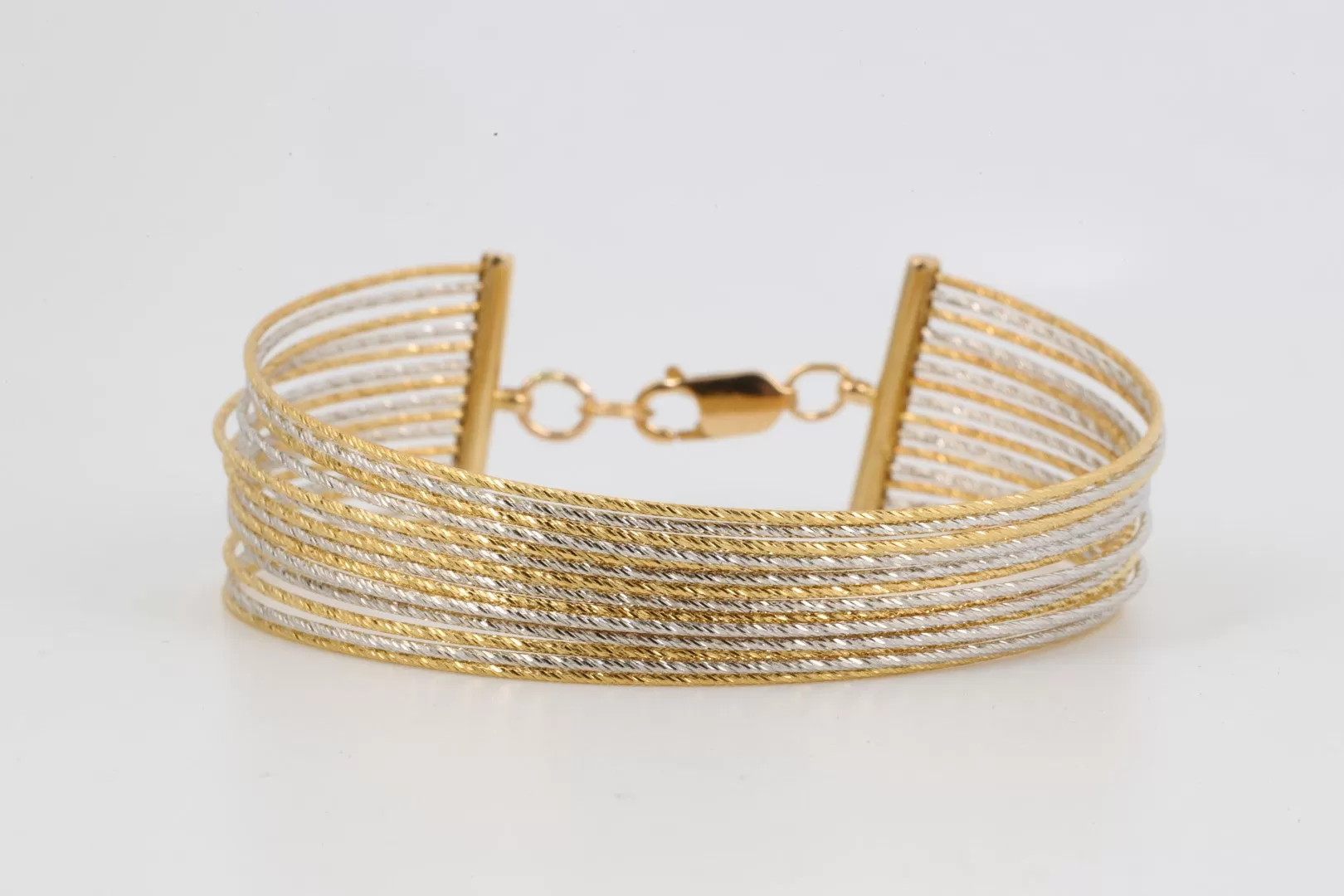 7.5" 21k Two-Tone Gold Bracelet (29.14g.)